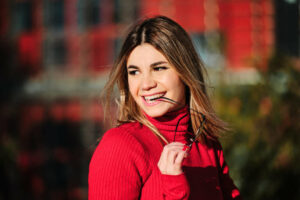 woman smiling outdoors on the street 2022 10 11 19 59 46 utc 1